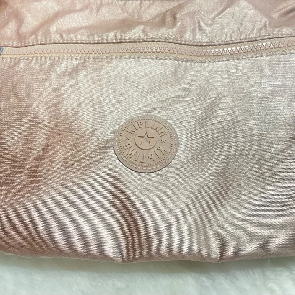 Rose Gold Kipling Pink Crossbody Bag with Signature Style